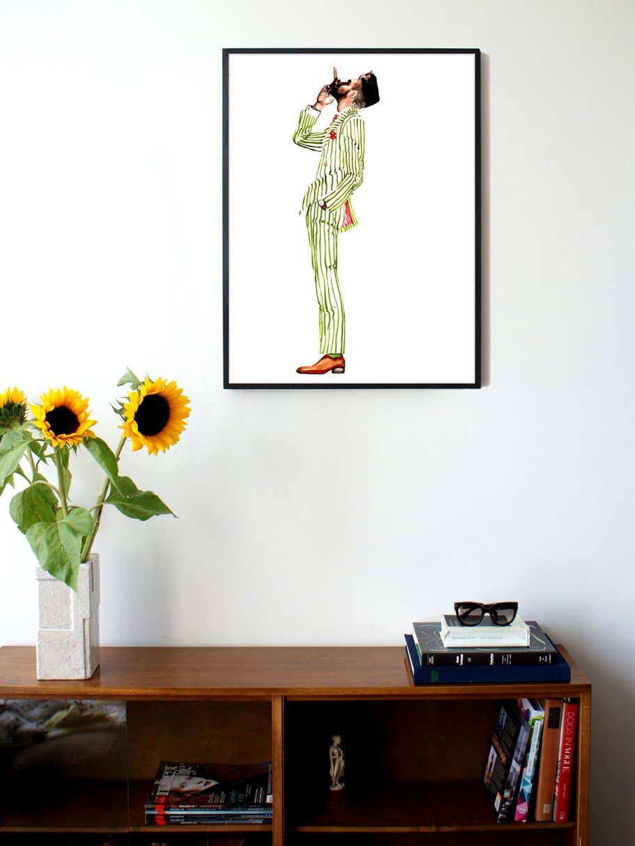 side profile illustration of a man smoking a cigar in a green suit hanging on a wall in the living room