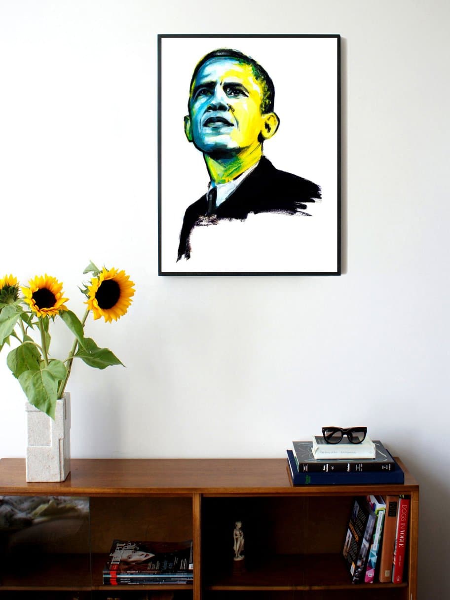 art portrait of president Obama with colored face hanging on the wall in the living room