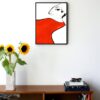 illustration of a womans face with a big red scarf around her neck hanging on a wall in the living room
